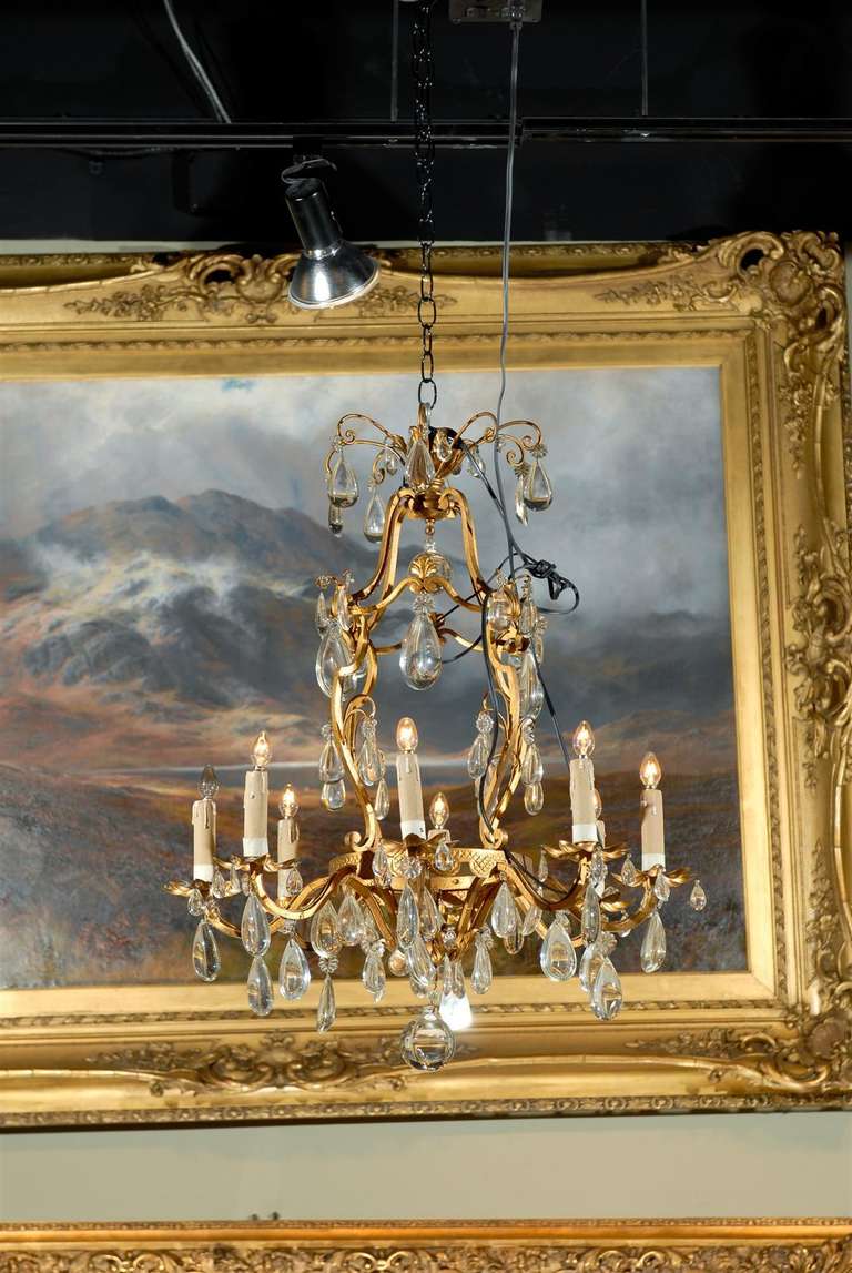Eight light crystal and bronze chandelier