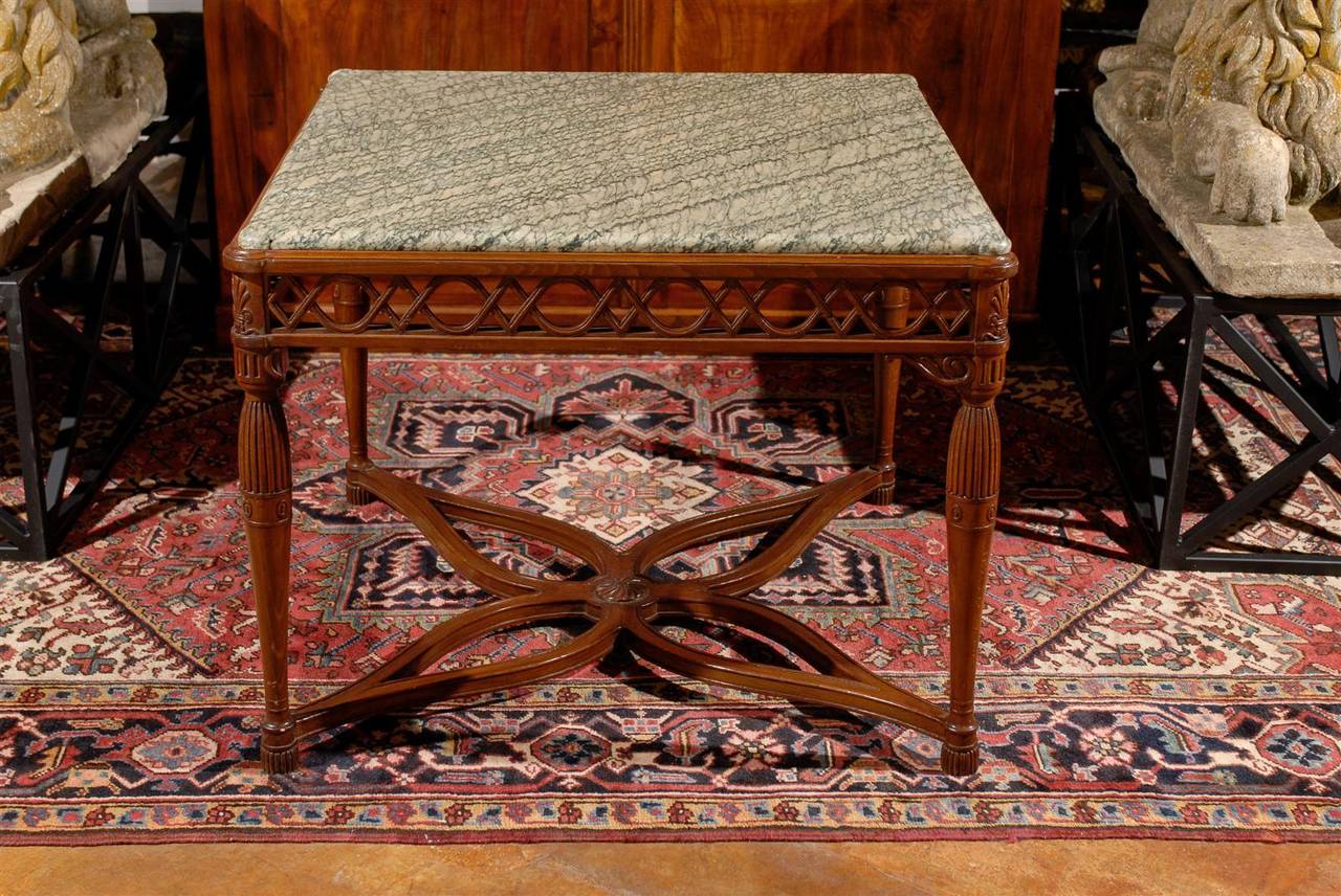 Carved 1820s Italian Walnut Marble-Top Center Table with Pierced Apron