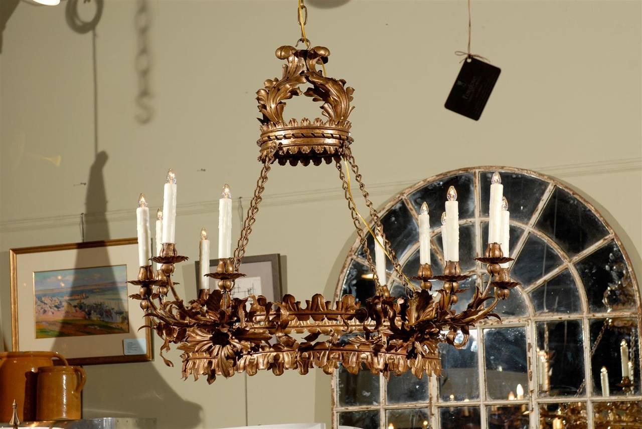 Venetian gilt iron chandelier with 12 arms, circa 1820.
