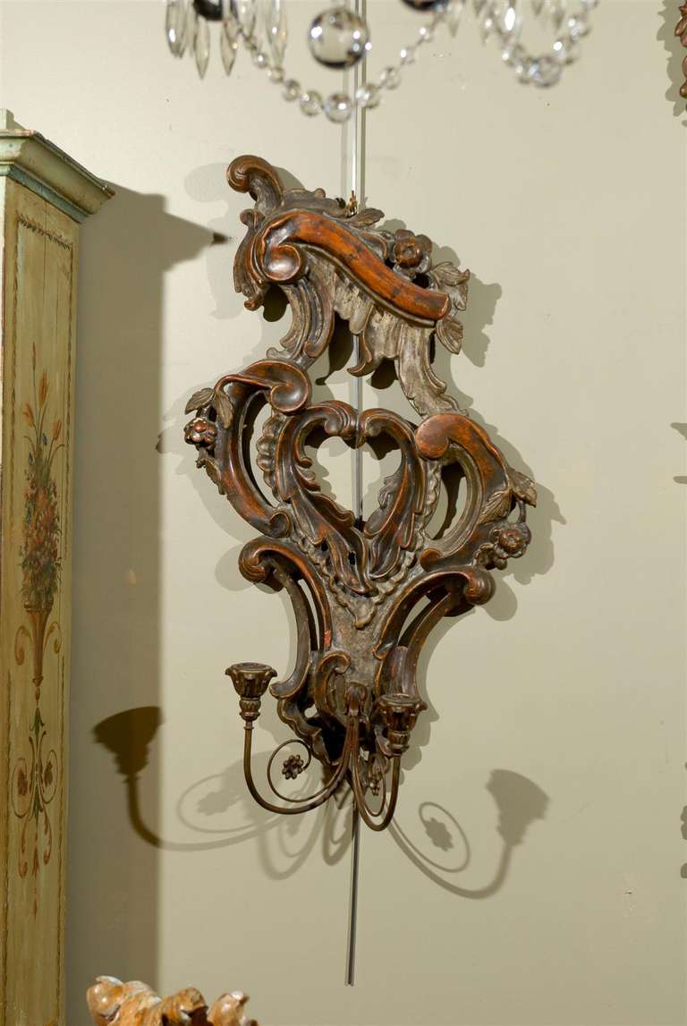 Pair of 19th century Italian Rococo Revival paint decorated two-light sconces.