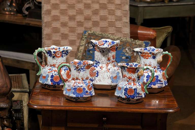 Set of Five Ironstone China Mason Jugs.  Decorated in the Imari palette, including four by Mason's.

Measurements:
Large: 9.75