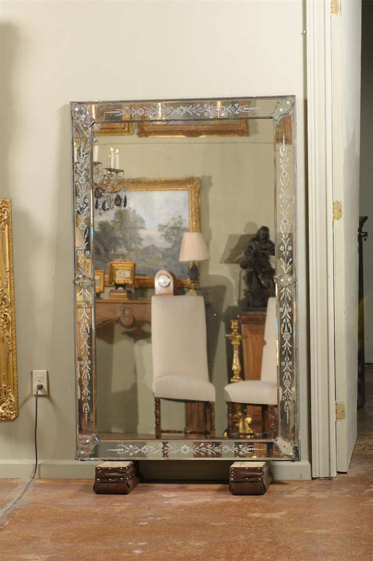 19th century large incised glass Venetian rectangular mirror, the central mirror surrounded by an incised border of Floriform decor.
