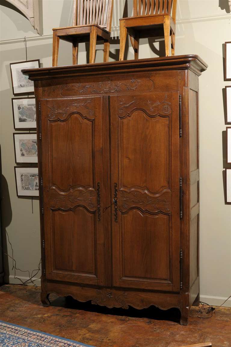 French double door armorie.  Interior three shelves are adjustable to accommodate a variety of uses.  Would bake a great TV cabinet or perfect for extra clothing storage.