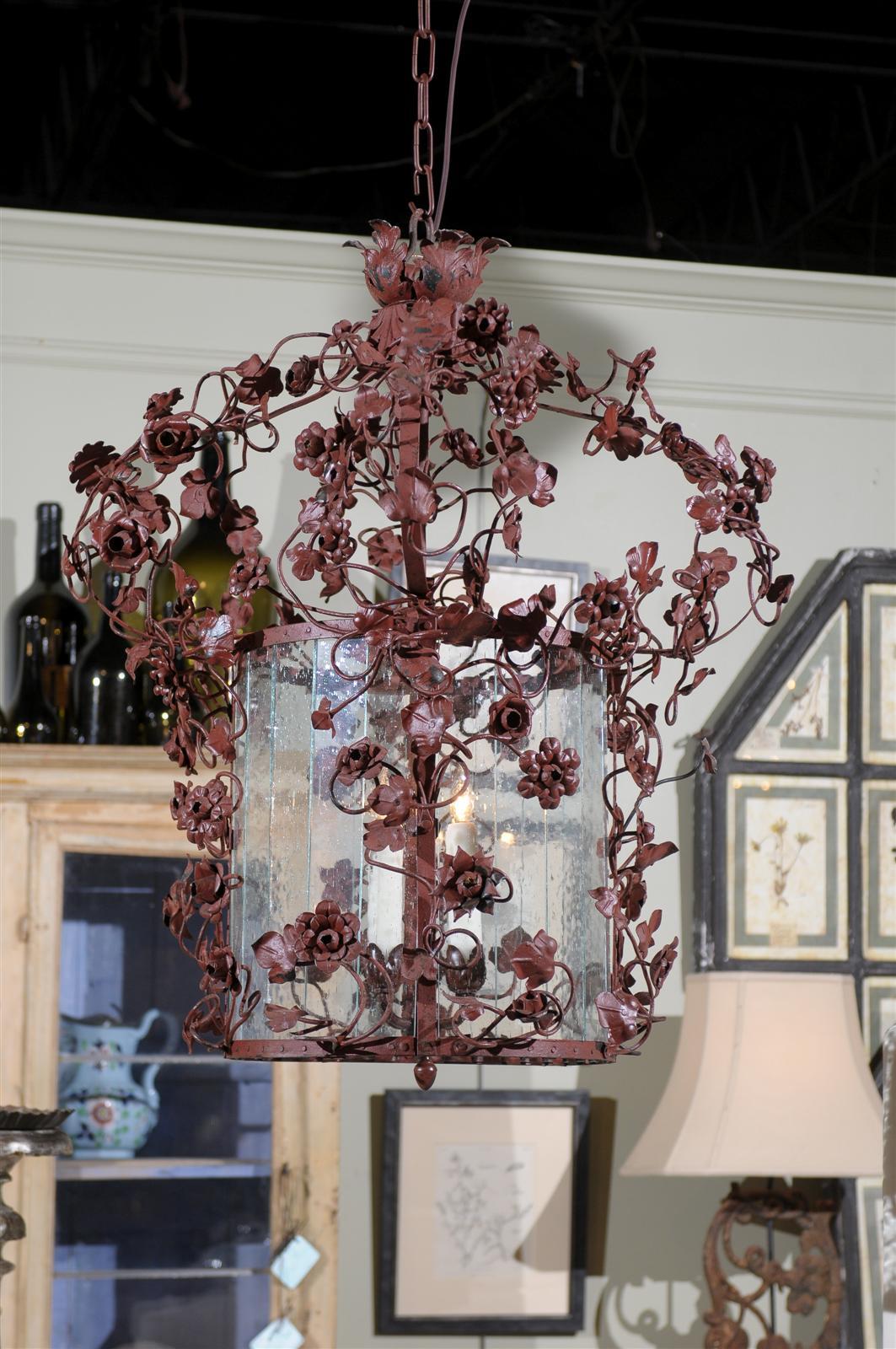 19th century Italian tole and seeded glass hanging circular lantern, with overall floriform motif and six lights.