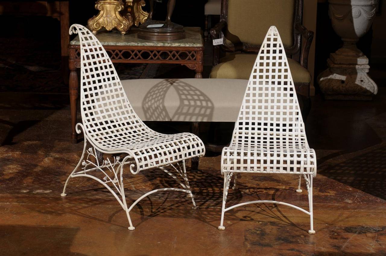 Pair of unusual vintage garden chairs from England.