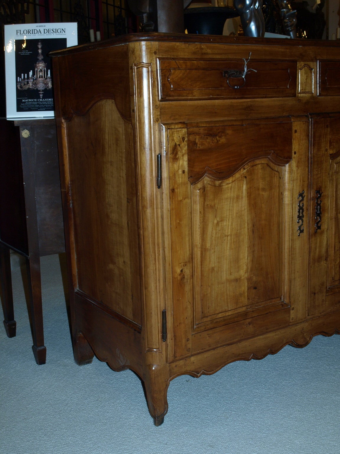 French provincial style buffet having two drawers over a lower two door cabinet. with one shelf.