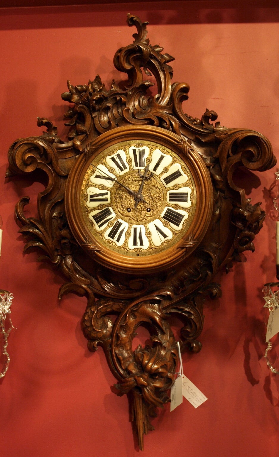 Incredibly carved walnut French wall clock, with face of bronze and porcelain, attributed to Gabriel - Frederick Viardot (1830-1906)
Furniture by Viardot is usually in the French Sino-Japanese manner that was the firms stock and trade. Their trading