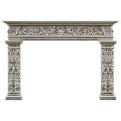 An antique Carved Statuary Marble fireplace mantel of Renaissance Revival style