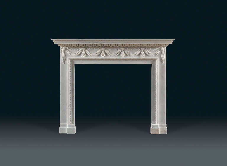 An outstanding 18th century, white statuary marble, neoclassical chimney piece, of superb quality, sculpted to the very highest standard. Originally from Merrion Square, Dublin, Irish, circa 1780.
The frieze with four inverted bunches of floral