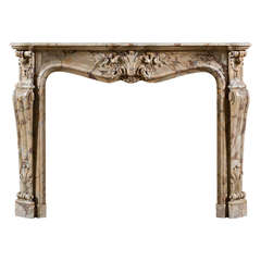 Antique Louis XV Style Fireplace Mantel Executed in Breccia Pernice Marble