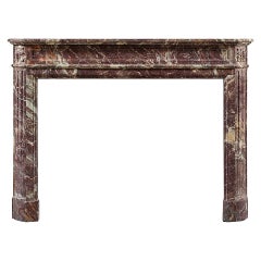 Cheminée ancienne française en marbre de style Louis XVI