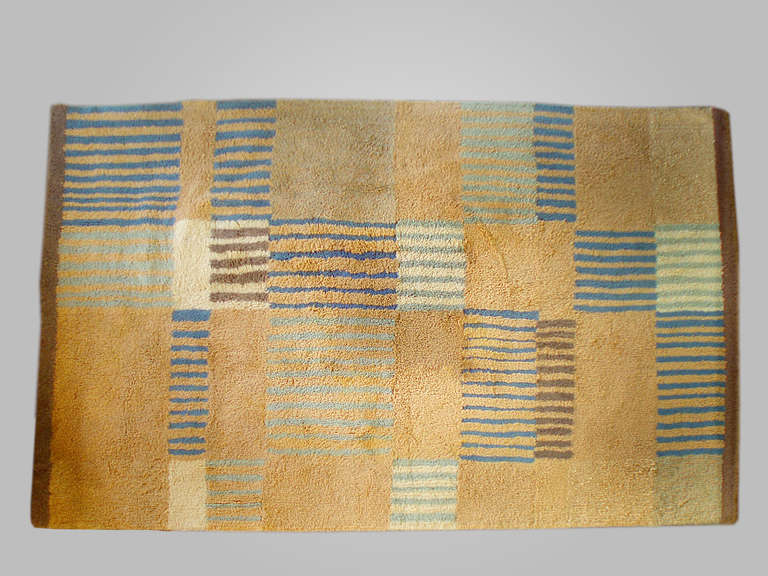 Modernist wool area rug made by JOTO.