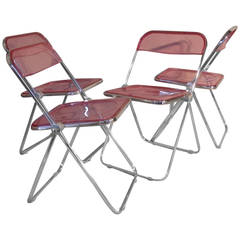 Vintage Set of Four Plia Lucite, Aluminum and Chrome Folding Chairs