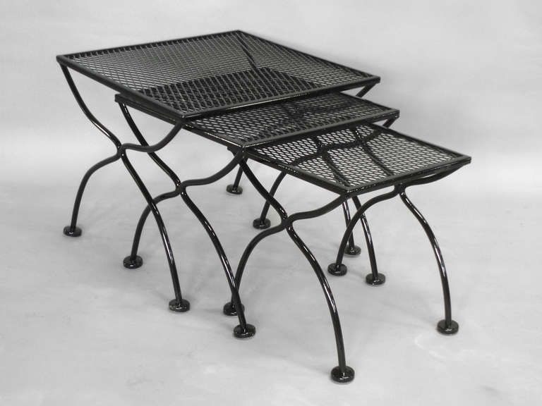 Wrought Iron and Mesh Nest of Outdoor Tables by Russell Lee Woodard.
Largest Table: 22.5