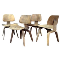 Vintage Four Rustic Finish Eames DCW Chairs Charles and Ray Eames