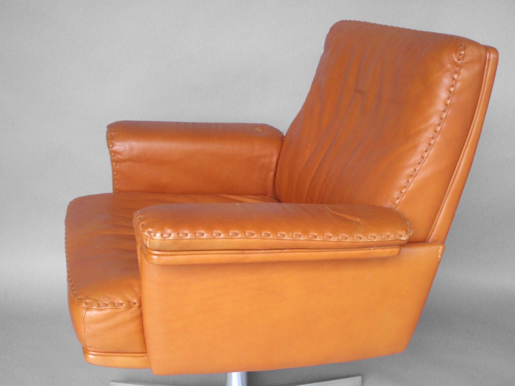 Swiss Pair of Leather Swivel Client Lounge Chairs