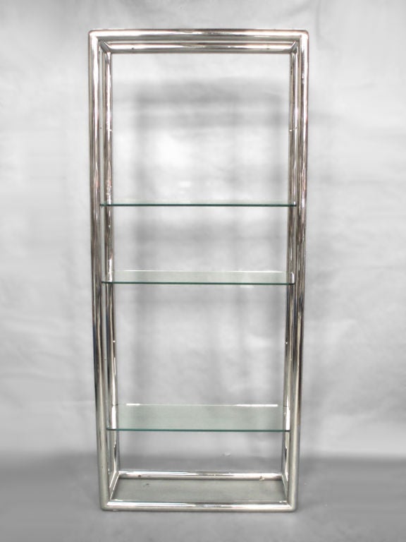 Glass and polished stainless steel shelf unit possibly pace. Five 3/8 thick glass shelves plus top and bottom. Some chips to edge of glass at mounting points.