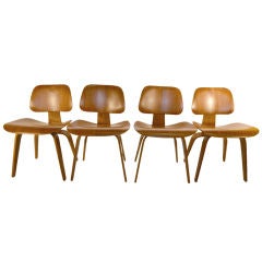 Set of Four Eames "DCW" - Dining Chairs Wood