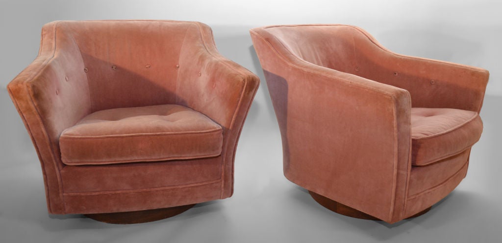 Pair Pink swivel tub chairs after Milo Baughman