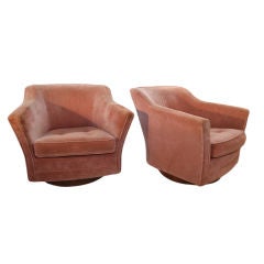 Pair Pink swivel tub chairs