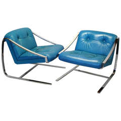 Polished Stainless Frame with Leather Seat Chairs by Charles Gibilterra