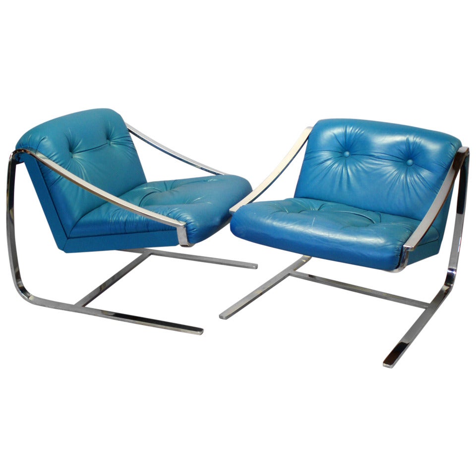 Polished Stainless Frame with Leather Seat Chairs by Charles Gibilterra
