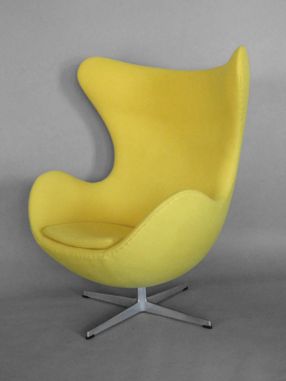 Properly restored Arne Jacobsen egg chair for Fritz Hansen. Fresh foam covered in correctly hand stitched Maharam tonus textile .