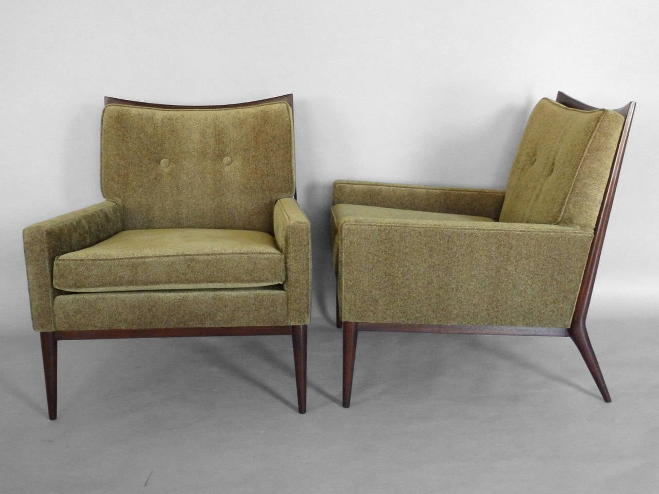 Pair of lounge chairs by Paul McCobb for Directional Furniture. Bases refinished and freshly re upholstered .
