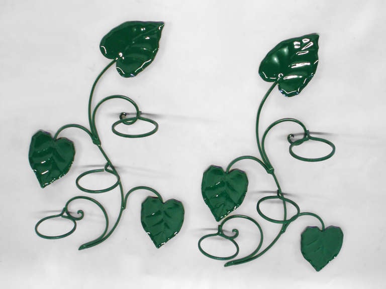 Pair of wrought iron climbing vine wall planters possibly by Woodard. Nicely restored in forest green powder coat.