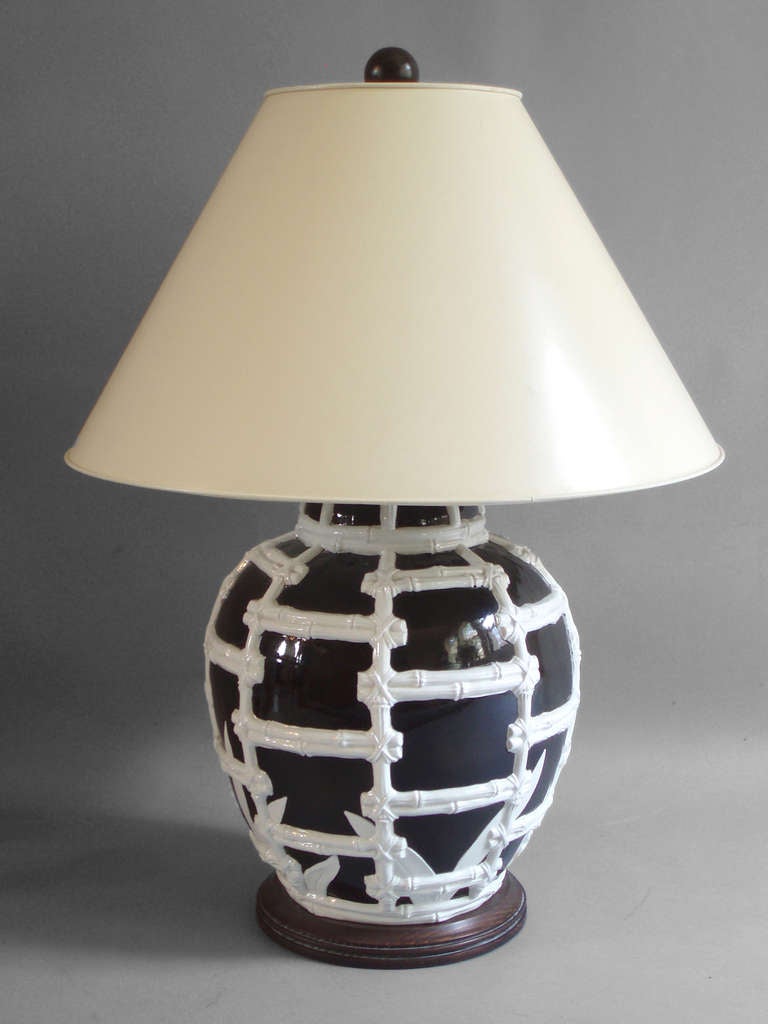 Bamboo embellished  black and white table lamp .