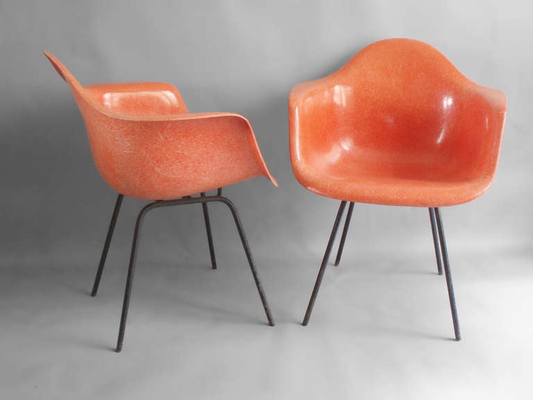 Pair Salmon Toned Fiberglass Bucket Chairs by Charles Eames for Herman Miller