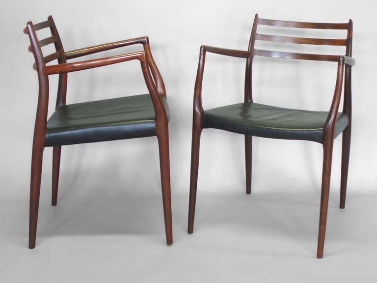 Mid-20th Century Set of Eight Vibrant Rosewood Dining Chairs by Niels O. Moller