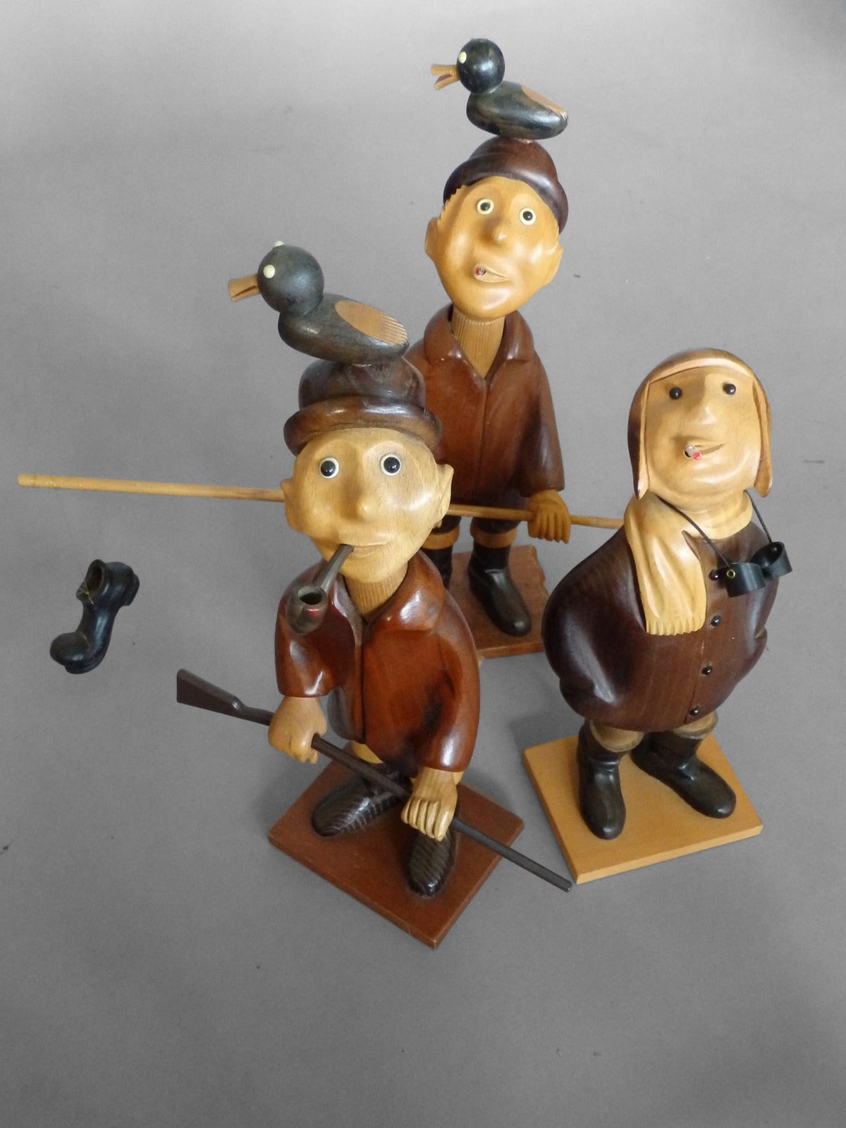 Carved wood collection bankers, doctors, police, builder, banker, lawyer, golf and tennis players
average measurements: 4.25 wide x 3.25 deep x 12.5 tall.