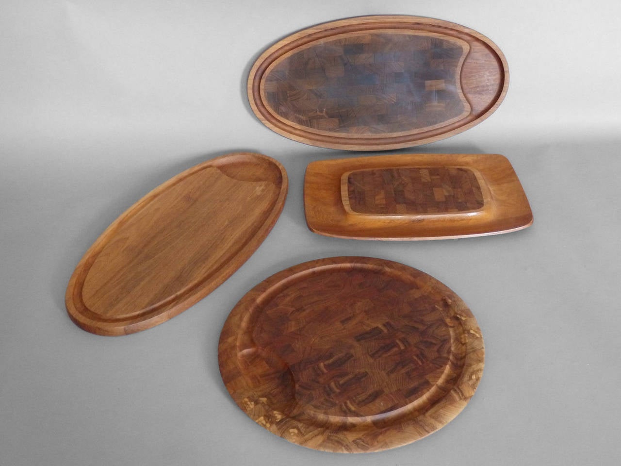 Collection of cutting board trays by JHQ Jens Quistgaard for Dansk.