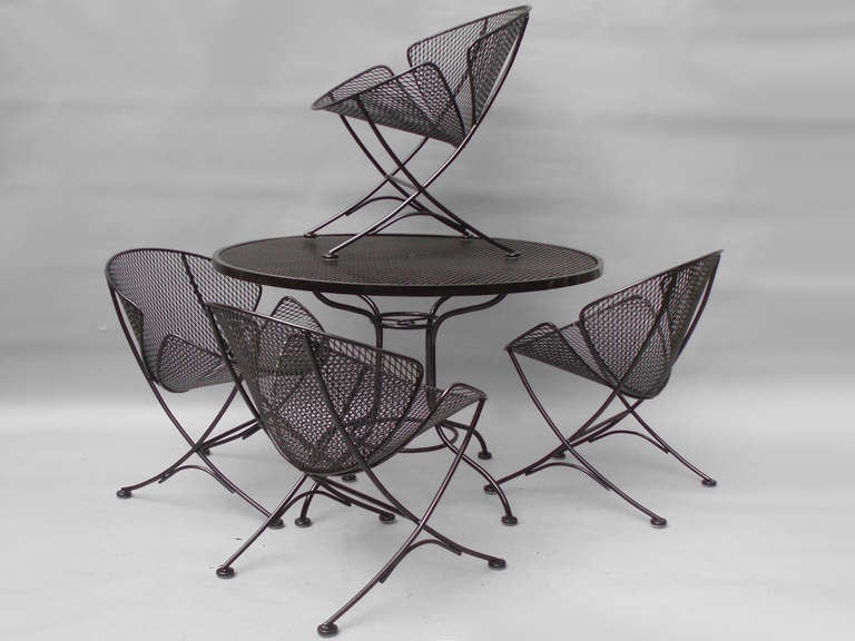Jet Age Wrought Iron Table with Four Chairs by Russel Lee Woodard