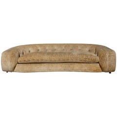 Sumptuous and Dramatic Down Cushion Curved Couch in the style of Jean Royere