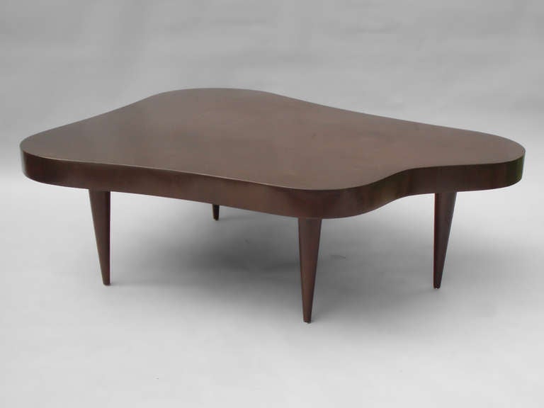 biomorphic free form coffee table in the style of gilbert rohde at biomorphic free form coffee table in the style of gilbert rohde at