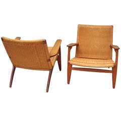 Pair of Teak with Danish Cord Lounge Chairs by Hans Wegner