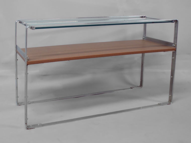 Art Deco machine age chrome sofa table console in the style of Donald Deskey for Lloyd or , Gilbert Rohde for troy sunshade. Some loss to plating . 