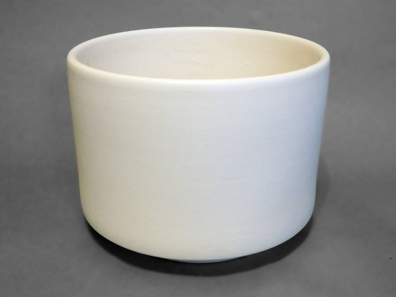 Large matte white planter pot in the style of Architectural Pottery of California.