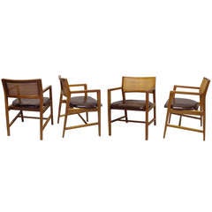 Set of Four Walnut Frame Leather Seat Cane Back Chairs by Edward Wormley