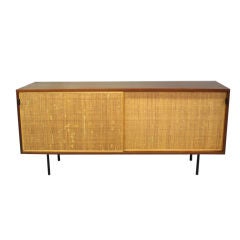 Sliding Cane Door Walnut Credenza by Florence Knoll