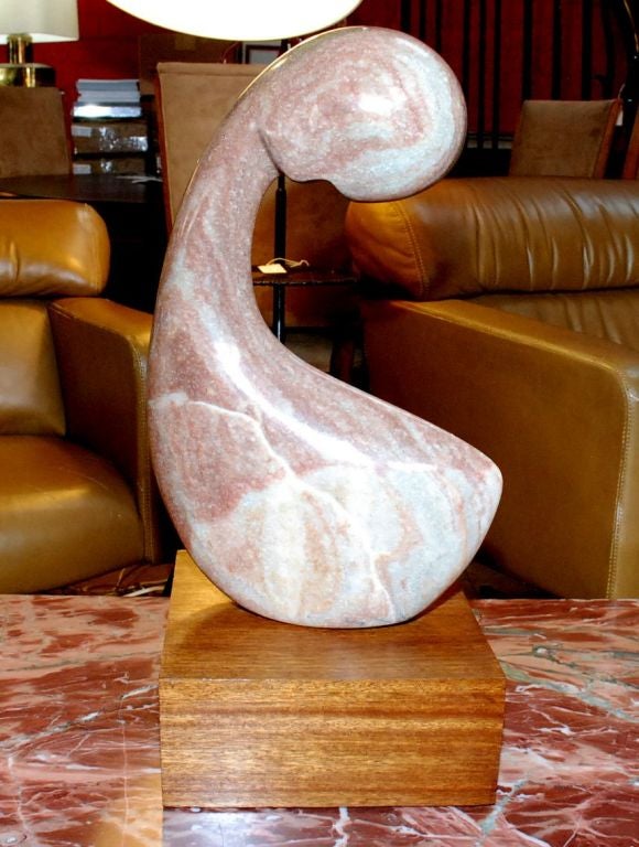 Colorful marble abstract sculpture with solid walnut base.
Provenance:
Title: New beginnings by Michael R Justice
Presented to the Las Vegas art museum in appreciation for their dedicated support for the desert sculptors association and for their