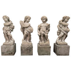 A set of Four Italian Composite Stone Statues