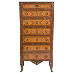 A Louis XV Style Marquetry Semainier or Chest of Drawers