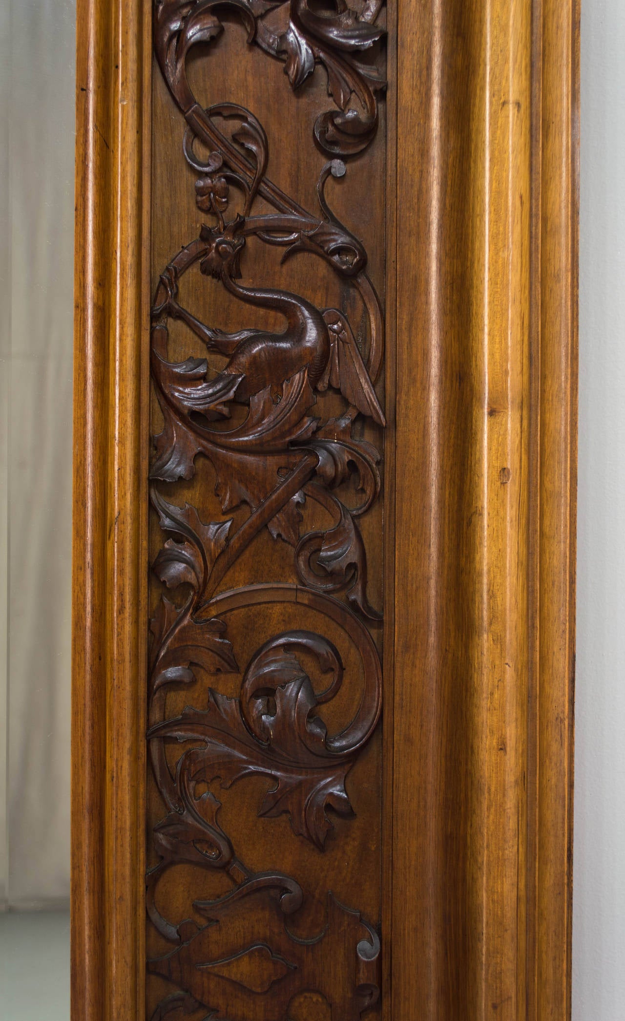 Italian Renaissance style mirror with carved walnut frame and sculptural crest. Bevelled mirror and great condition.
As always, more photos available upon request. We have a large selection of French antiques. Please visit our web site.