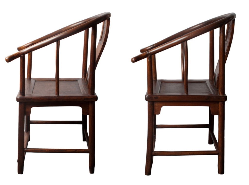 A great pair of arm chairs made of Yumu or northern Elm. Good and sturdy.<br />
<br />
MORE ANTIQUES AVAILABLE AT WWW.OFLEURY.COM