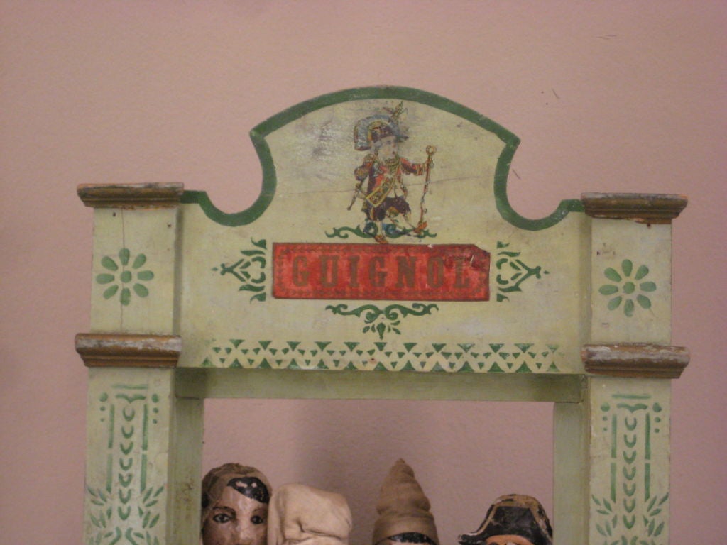 Wood French Guignol Theater with four puppets