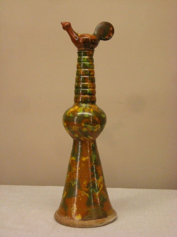 A very decorative French roof ornament made of terra cotta and glazed in the manner of Jaspe ware.<br />
For many more fine antiques, please visit our online gallery at: www.ofleury.com