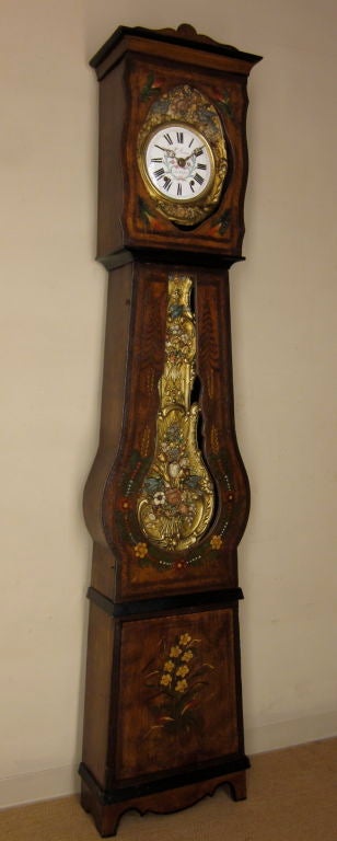 A very decorative 7 day Comtoise or Tall case Clock, chimes on the hour and two minutes after, and on the half. Movement professionally cleaned. Original glass. <br />
Originaly this clock was sold by Mr. P. Monnoir at La Brufiere, a small town in